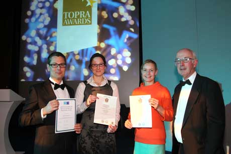 Aaron Cousins ,Elke Hofer-Litzlbauer and Katrina Ashcroft receive their graduation certificates